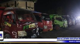 Caption: 5 unit truk pengangkut batu hitam diduga ilegal yang diamankan Ditreskrimsus Polda Gorontalo.