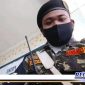 Caption: Kepala Satuan Koordinasi Rayon (Satkoryon) Banser Kenjeran Surabaya (Rio Gunawan).