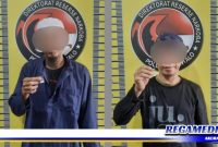 Caption: dua pelaku kasus narkoba inisial (AS) dan (MHB) saat diamankan Ditnarkoba Polda Gorontalo.