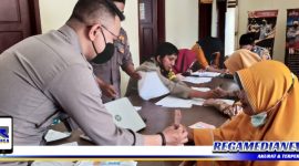 Caption: saat pendistribusian BT-PKLWN di Polsek Kwandang, Gorontalo Utara.