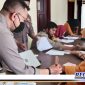 Caption: saat pendistribusian BT-PKLWN di Polsek Kwandang, Gorontalo Utara.
