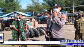 Caption: petugas gabungan Pos PAM Camplong, saat memberikan imbauan kepada para pengunjung wisata Pantai Camplong.