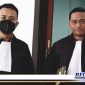 Caption: tim kuasa hukum aktivis HK aliyas Hengki.