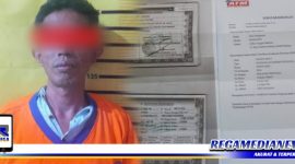 Caption: tersangka inisial (Z) saat diamankan di Mapolsek Tambaksari Surabaya.