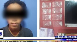 Caption: tersangka inisial (DWA) dan barang buktinya diamankan di Mapolres Pelabuhan Tanjung Perak Surabaya.