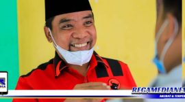Caption: anggota DPRD Provinsi Jawa Timur (Mahfud S. Ag) dari Fraksi PDI Perjuangan.