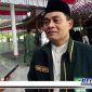 Caption: Ketua DPW Barikade Gus Dur Jatim, (Ahmad Rizal), saat diwawancara awak media.
