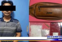 Caption: tersangka inisial (MA) beserta barang buktinya saat diamankan di Mapolres Pelabuhan Tanjung Perak Surabaya.