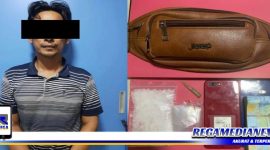 Caption: tersangka inisial (MA) beserta barang buktinya saat diamankan di Mapolres Pelabuhan Tanjung Perak Surabaya.