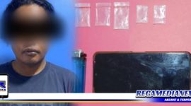 Caption: tersangka inisial (MU) dan barang buktinya diamankan di Mapolres Pelabuhan Tanjung Perak.