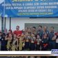 Caption: Kepala Disdik Sampang ditengah-tengah peserta festival lomba seni siswa nasional jenjang SD.