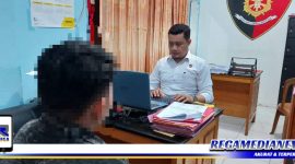 Caption: pelaku penikaman di Caffe NMC saat diperiksa penyidik Polres Gorontalo Kota.