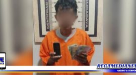 Caption: tersangka inisial (SL) dan barang buktinya diamankan di Mapolsek Asemrowo.