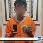 Caption: tersangka inisial (SL) dan barang buktinya diamankan di Mapolsek Asemrowo.