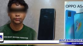 Caption: tersangka inisial (RS) dan barang buktinya diamankan di Mapolsek Genteng Surabaya.