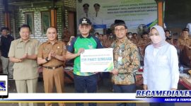Caption: BPJS Ketenagakerjaan Madura bersama Bupati Bangkalan saat launching Kepesertaan Jaminan Sosial.