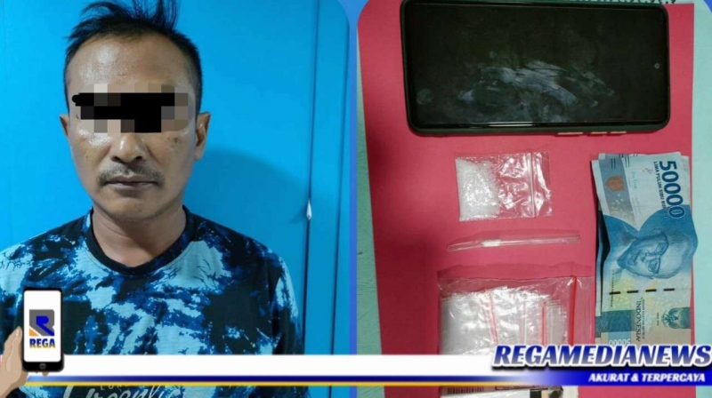 Caption: inisial DN 44 tahun saat ditangkap petugas Satuan Reserse Narkoba.