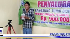 Caption: Pemdes Lepelle melakukan pengambilan gambar terhadap penerima BLT DD periode Januari - Maret tahun 2022.