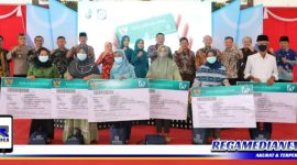Caption: launching Program Universal Health Coverage (UHC) dan Publik Safety Center (PSC) 199, di Pendopo Trunojoyo Sampang.