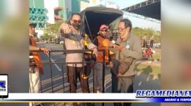 Caption: Kapolsek Tegalsari (Kompol Dwi Nugroho) saat melarang  wartawan liputan pertandingan sepak bola.