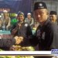 Caption: pengesahan warga baru PSHT dari tahun 2019 sampai 2022, dilapangan futsal Kaliasin Surabaya.