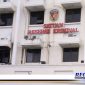 Caption: Gedung Satreskrim Polrestabes Surabaya.