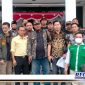 Caption: dampingi kuasa hukumnya, GP Ansor dan Banser datangi Mako Polrestabes Surabaya.
