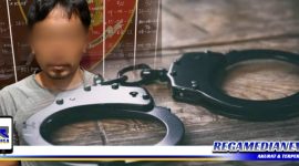 Caption: inisial LY, pelaku pembunuhan di Desa Gunung Maddah saat diamankan di Mako Polres Sampang.