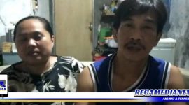 Caption: orang tua gadis dibawah umur, korban pengancaman (paksa video call, red) yang melapor ke Polres Gresik, (Dok. Basori/Regamedianews).