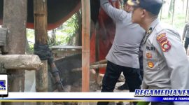 Caption: Polres Gorut saat grebek tempat penyulingan miras, (Dok. Yusrianto/Regamedianews).