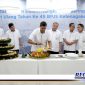 Caption: Dirut BPJS Ketenagakerjaan Anggoro Eko Cahyo saat potong tumpeng memperingati HUT BPJS Ketenagakerjaan ke 45, (Dok. foto istimewa).