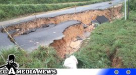 Caption: di sekitar jalan yang ambles terpasang garis police line, (dok. red regamedianews).