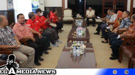 Caption: kunjungan jajaran pengurus DPC PBB yang dipimpin Ketuanya R.A. Aruan diruang kerja Bupati. (Foto/ir) 