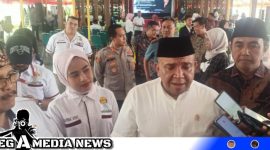 Caption: Wakil Menteri Ketenagakerjaan Afriansyah Noor saat diwawancara awak media, (dok. regamedianews).