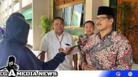 Caption: Plt Bupati Bangkalan Moh.Mohni saat diwawancara awak media, (dok. regamedianews).