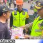 Caption: Wakapolrestabes Medan berikan bantuan kepada korban banjir, (dok. Joni Regamedianews).