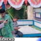 Caption: KBO Satbinmas Polres Sampang memberikan arahan kepada petugas Satkamling Desa Rapa Daya, (dok. regamedianews).