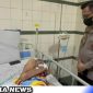 Caption: Kapolresta Deli Serdang jenguk dua anggotanya yang sakit, (dok. regamedianews).