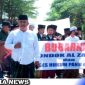 Caption: massa FUIB Madura saat bergerak menuju kantor Kemenag Sampang, (dok. regamedianews).