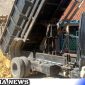 Caption: pengirimaan bahan material ke lokasi sasaran fisik program TMMD di Desa Pasarenan Kedungdung Sampang, (dok. regamedianews). 