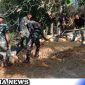 Caption: Satgas TMMD Sampang bergotong royong mengerjakan pembangunan betonisasi di Desa Pasarenan, (dok. regamedianews). 