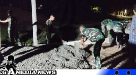 Caption: saat malam pengerjaan rabat beton di Desa Pasarenan Kedungdung terus kebut dilakukan Satgas TMMD Kodim 0828 Sampang, (dok. regamedianews). 