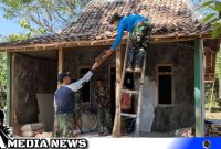 Caption: Satgas TMMD Sampang, bersama TNI AU dan warga tengah melakukan pengerjaan tahap finishing rehab rutilahu, (dok. regamedianews). 