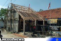 Caption: pengerjaan ruang guru baru SDN Pasarenan 2 oleh Satgas TMMD Kodim 0828 Sampang sudah tahap finishing, (dok. regamedianews). 