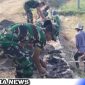 Caption: Satgas TMMD bersama warga mulai melakukan pembangunan jalan rabat beton, (dok. regamedianews).
