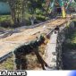 Caption: Satgas TMMD Kodim 0828 Sampang tampak meneruskan pengerjaan plengsengan di lokasi betonisasi, (dok. regamedianews).