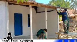 Caption: personel Satgas TMMD Sampang kebut finishing renovasi rutilahu, (dok. regamedianews). 