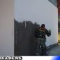 Caption: personel Satgas TMMD Kodim 0828 Sampang kebut finishing rutilahu, (dok. regamedianews). 