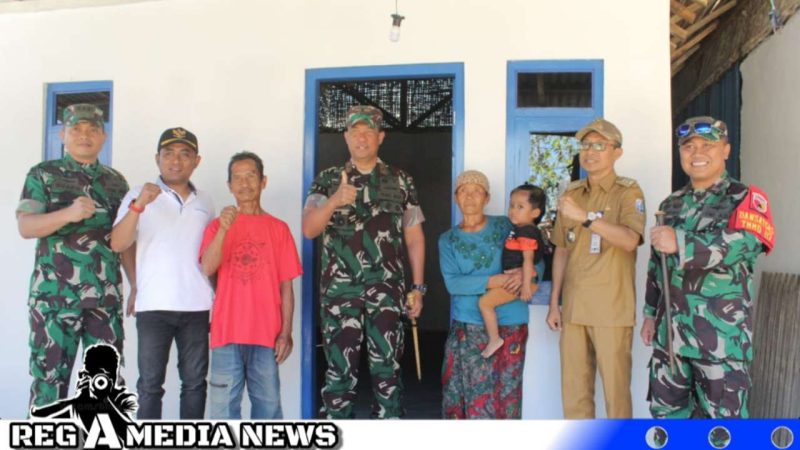 Caption: Danrem 084 Bhaskara Jaya, didampingi Dandim Sampang, Camat Kedungdung, Kades Pasarenan saat meninjau hasil renovasi rutilahu program TMMD ke-117, (dok. regamedianews). 