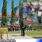 Caption: Komandan Guskamla Koarmada II saat pimpin upacara penutupan TMMD Ke-117, di Pendopo Trunojoyo Bupati Sampang, (dok. regamedianews). 